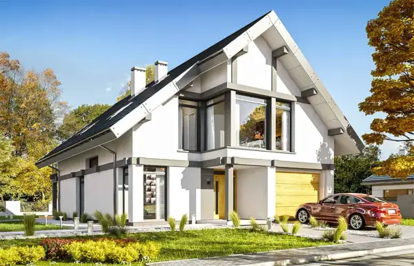 Nowoczesny dom 70m2 z poddaszem, z dużymi oknami i garażem. Otoczony zielenią i jesiennymi drzewami.